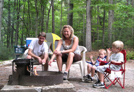 Family around the campfire.